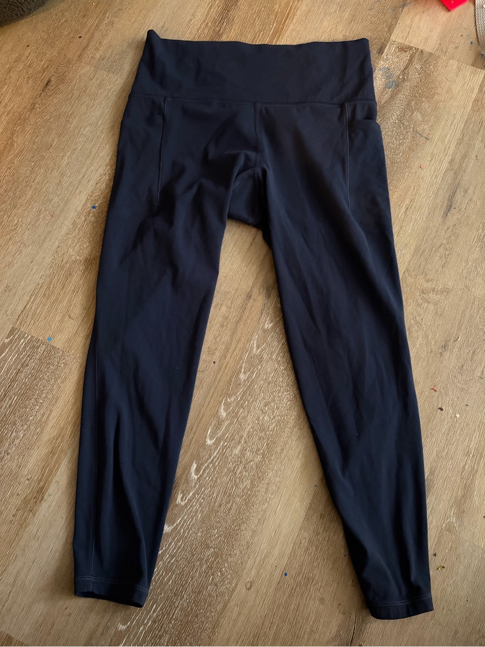 Athleta Salutation Stash 7/8 Tight Medium in Navy